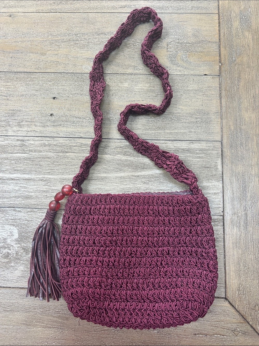 Sharif Woven Burgundy Crossbody Bag with Leather Tassel Zipper Pull